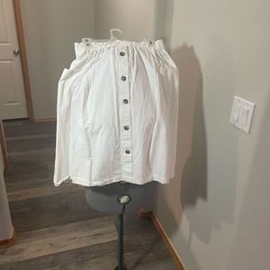 White circle skirt with faux buttons and real pockets